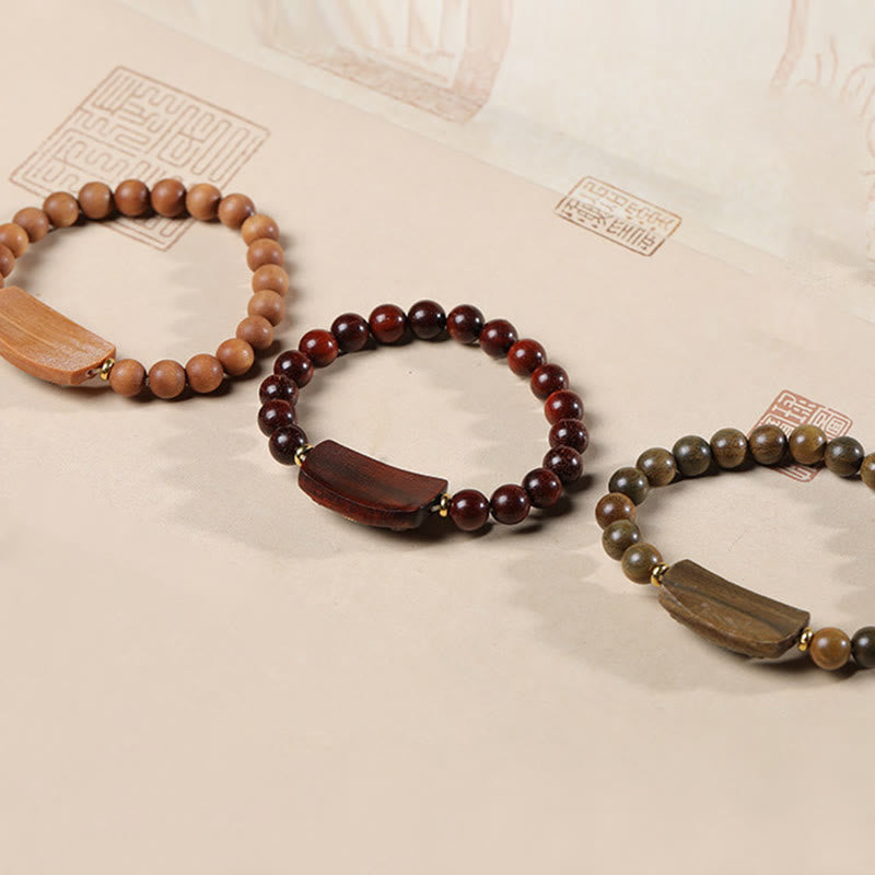 Pulsera de seis palabras verdaderas de la paz con hojas pequeñas de sándalo rojo y sándalo verde y piedras de Buddha Stones