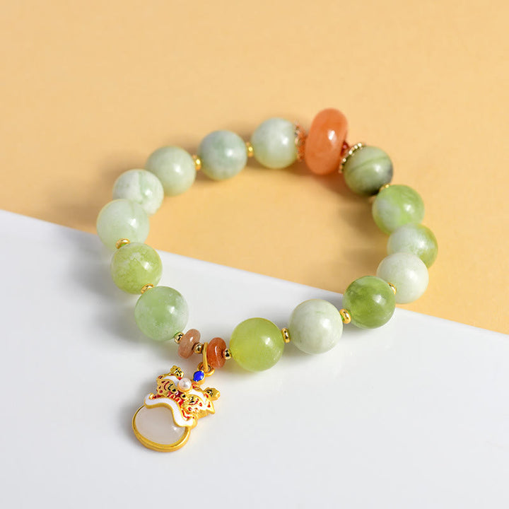 Pulsera de la suerte y la prosperidad con amuleto de león danzante de jade natural de Buddha Stones