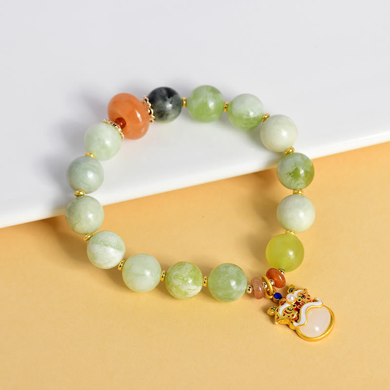 Pulsera de la suerte y la prosperidad con amuleto de león danzante de jade natural de Buddha Stones
