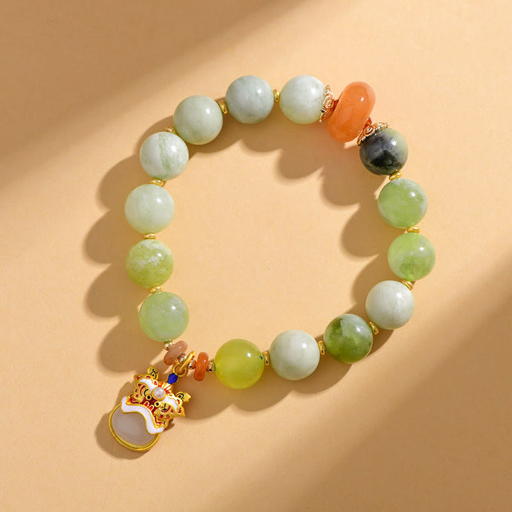 Pulsera de la suerte y la prosperidad con amuleto de león danzante de jade natural de Buddha Stones