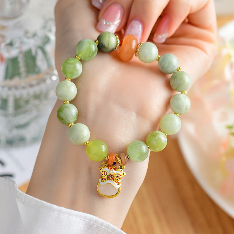 Pulsera de la suerte y la prosperidad con amuleto de león danzante de jade natural de Buddha Stones