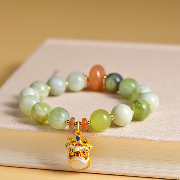 Pulsera de la suerte y la prosperidad con amuleto de león danzante de jade natural de Buddha Stones