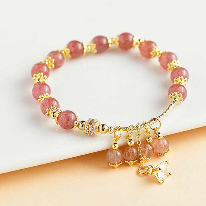 Pulsera positiva de curación con cristales de cuarzo fresa y circonitas naturales de Buddha Stones
