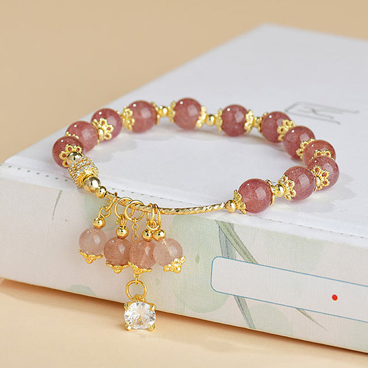 Pulsera positiva de curación con cristales de cuarzo fresa y circonitas naturales de Buddha Stones