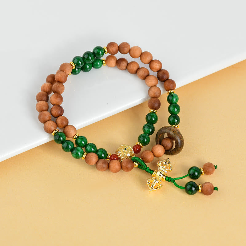 Pulsera de protección y curación con diseño de doble torsión de vajra, dorje tibetano y cuentas de madera de sándalo y Buddha Stones