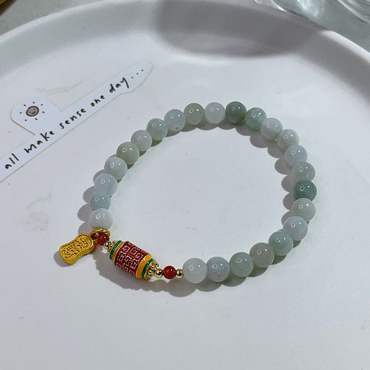 Pulsera de abundancia y prosperidad con rueda de oración con caracteres Fu de jade natural tibetano y Buddha Stones