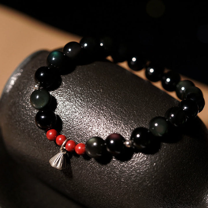 Pulsera de fuerza con dije de loto y cinabrio de obsidiana negra natural de Buddha Stones