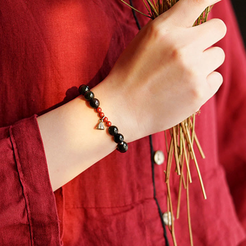 Pulsera de fuerza con dije de loto y cinabrio de obsidiana negra natural de Buddha Stones