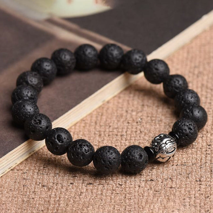 Pulsera de riqueza PiXiu de cobre blanco con cuentas de roca de lava y Buddha Stones