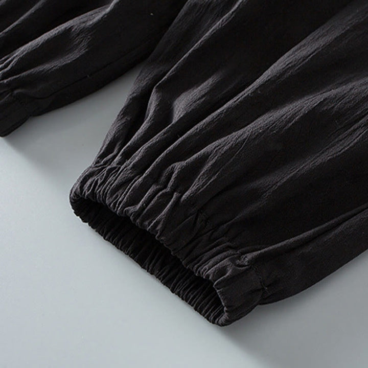 Pantalones de camisa de manga tres cuartos con botones de rana y Buddha Stones para hombre