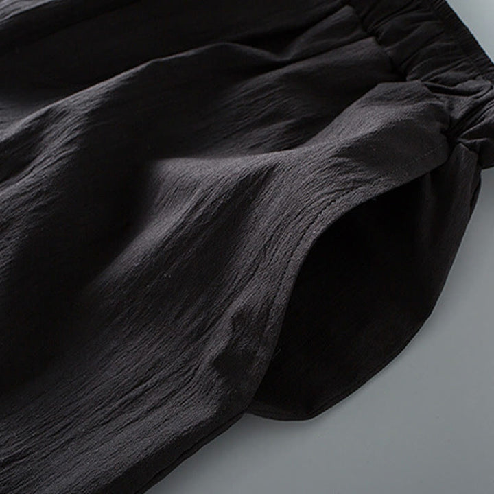 Pantalones de camisa de manga tres cuartos con botones de rana y Buddha Stones para hombre