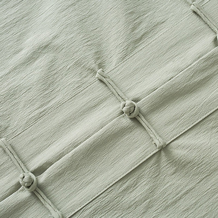 Pantalones de camisa de manga tres cuartos con botones de rana y Buddha Stones para hombre