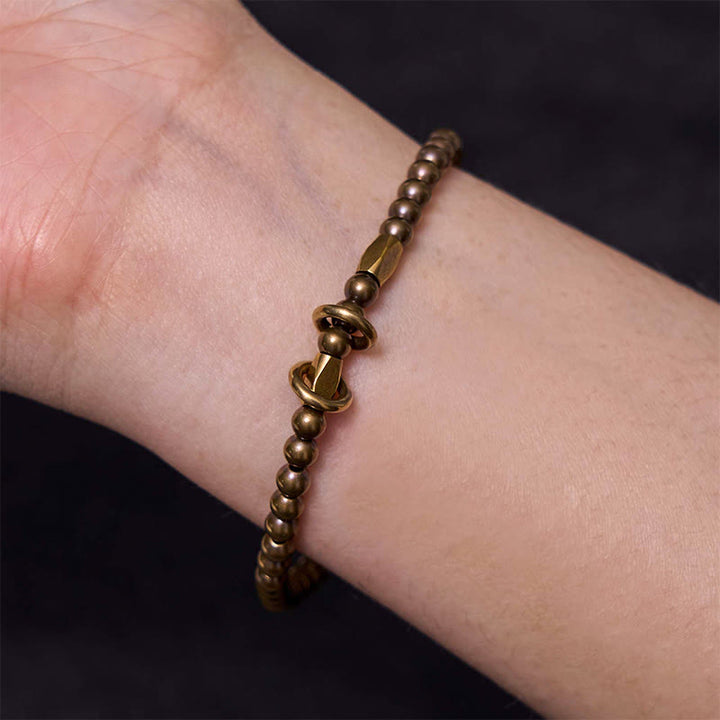 Pulsera de pareja con diseño de cuentas de cobre y latón para el cuidado personal y la riqueza de Buddha Stones - image 6