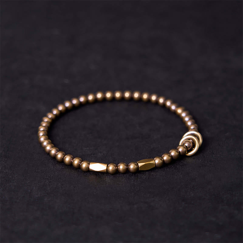 Pulsera de pareja con diseño de cuentas de cobre y latón para el cuidado personal y la riqueza de Buddha Stones - image 1