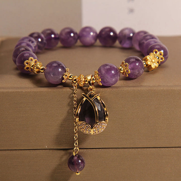 Buddha Stones Pulsera curativa con dije de lirio y amatista - Amatista (circunferencia de la muñeca: 14-17 cm) - image 0