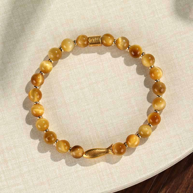 Pulsera de coraje con pez koi y ojo de tigre de Buddha Stones