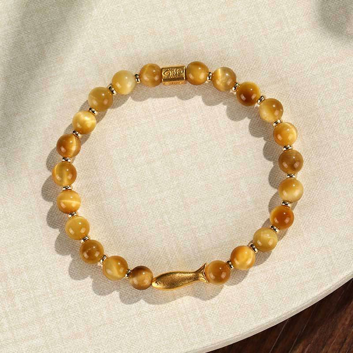Pulsera de coraje con pez koi y ojo de tigre de Buddha Stones