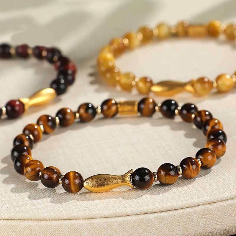 Pulsera de coraje con pez koi y ojo de tigre de Buddha Stones