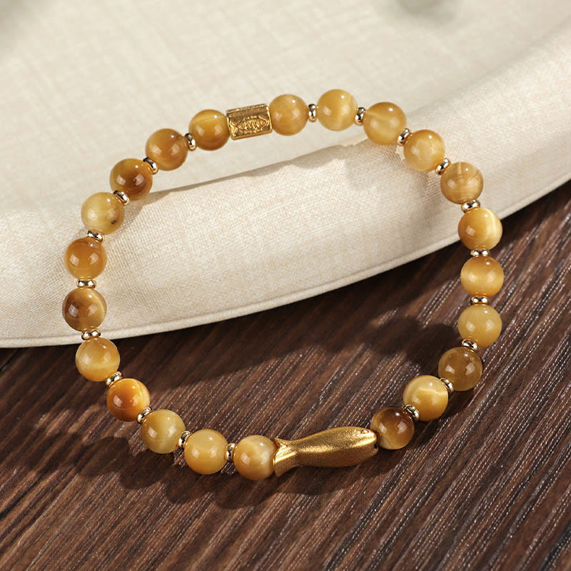 Pulsera de coraje con pez koi y ojo de tigre de Buddha Stones