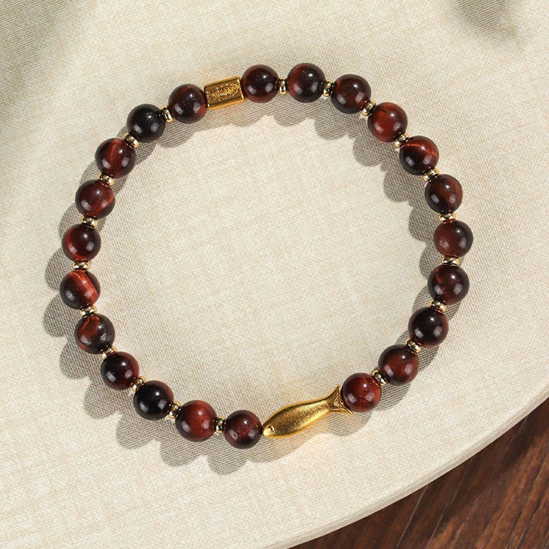Pulsera de coraje con pez koi y ojo de tigre de Buddha Stones