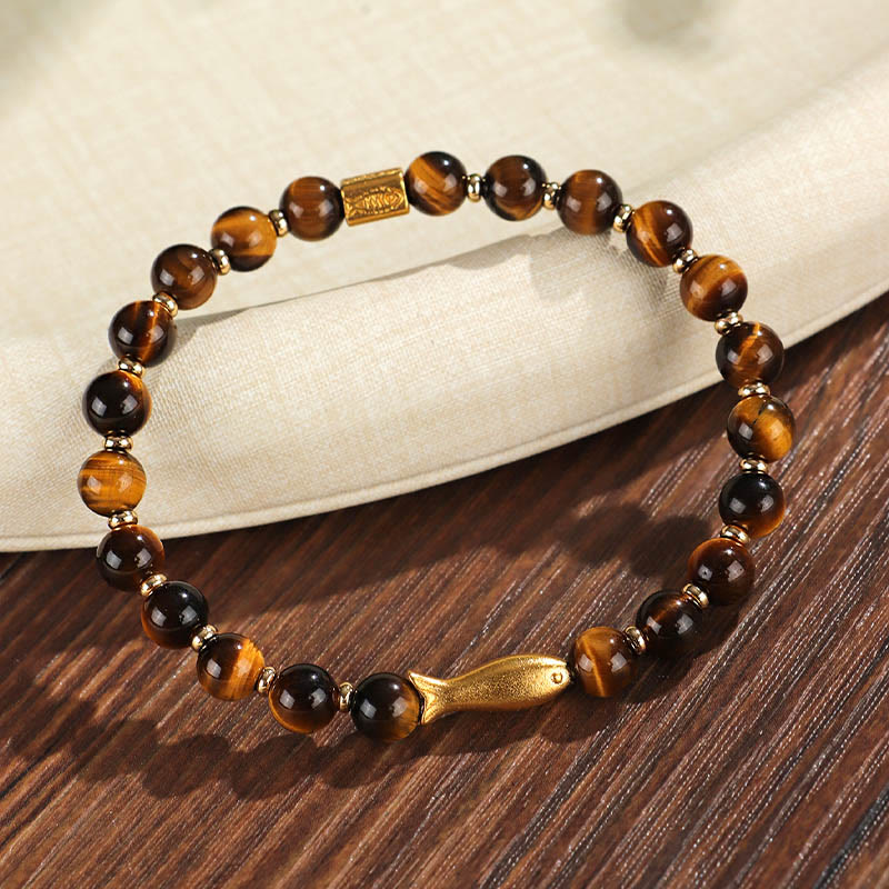 Pulsera de coraje con pez koi y ojo de tigre de Buddha Stones