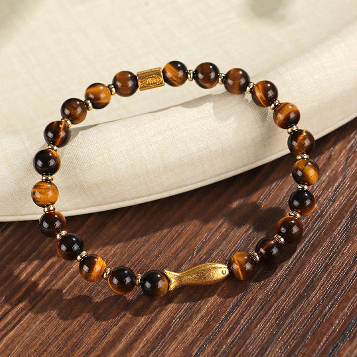 Pulsera de coraje con pez koi y ojo de tigre de Buddha Stones
