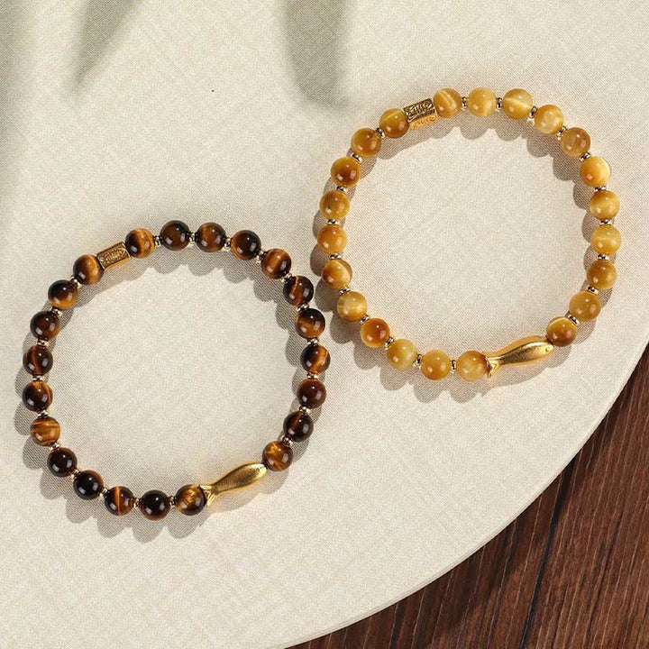 Pulsera de coraje con pez koi y ojo de tigre de Buddha Stones