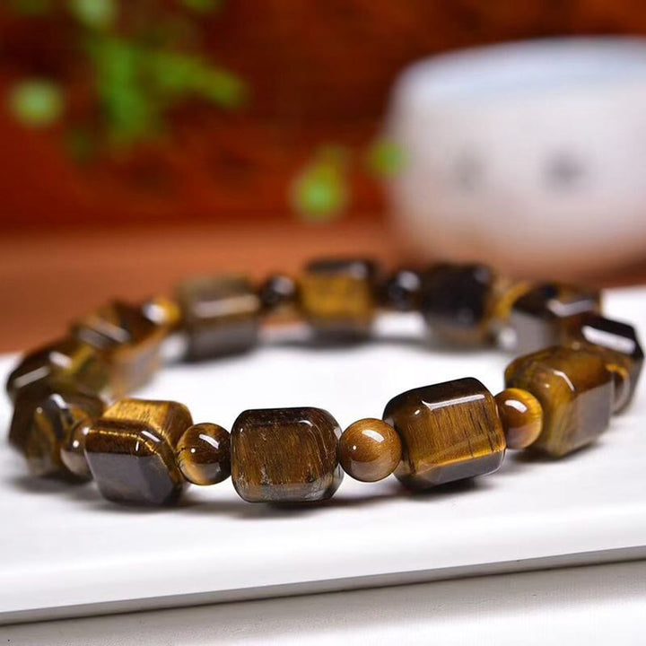Pulsera protectora de ojo de tigre con Buddha Stones