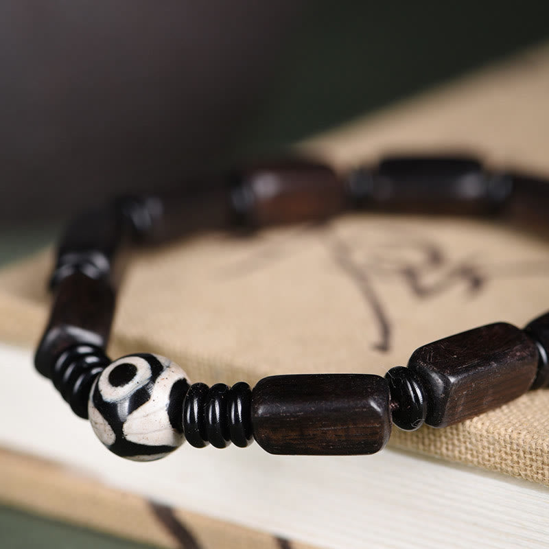 Pulsera de equilibrio con cuentas rectangulares de madera de ébano y Buddha Stones