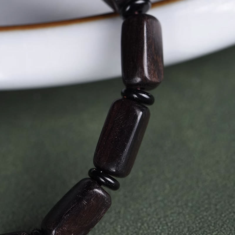Pulsera de equilibrio con cuentas rectangulares de madera de ébano y Buddha Stones