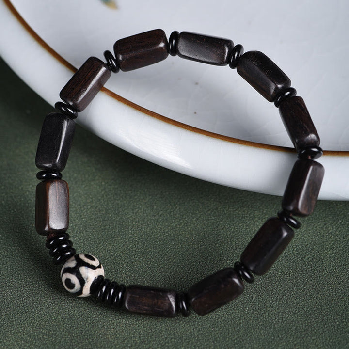 Pulsera de equilibrio con cuentas rectangulares de madera de ébano y Buddha Stones