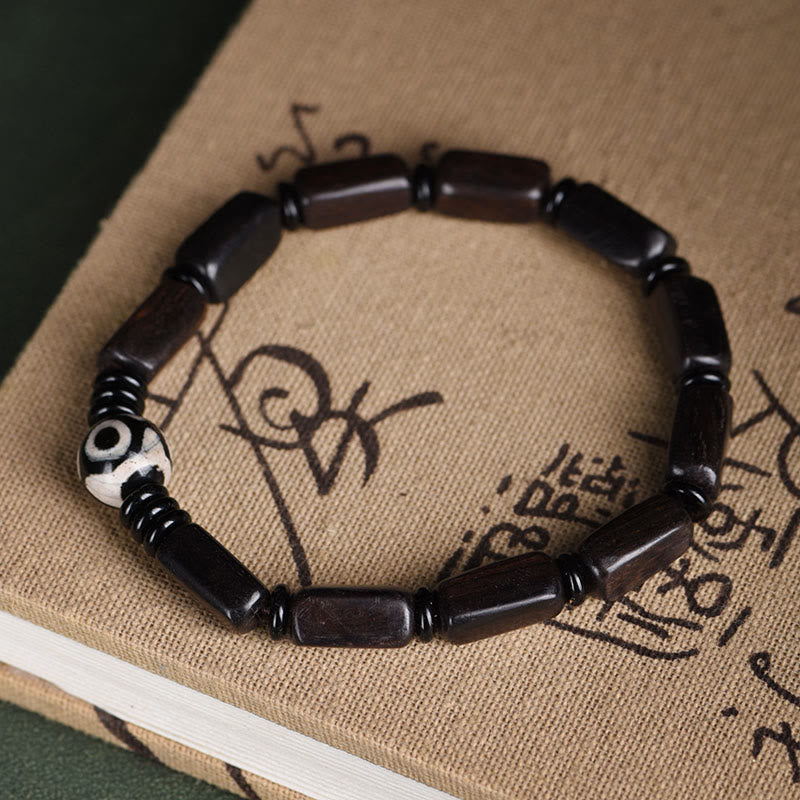 Pulsera de equilibrio con cuentas rectangulares de madera de ébano y Buddha Stones