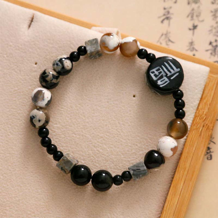 Pulsera con personaje de la suerte Fu, Buddha Stones , cerámica, ónix negro, ágata y piedra brillante negra