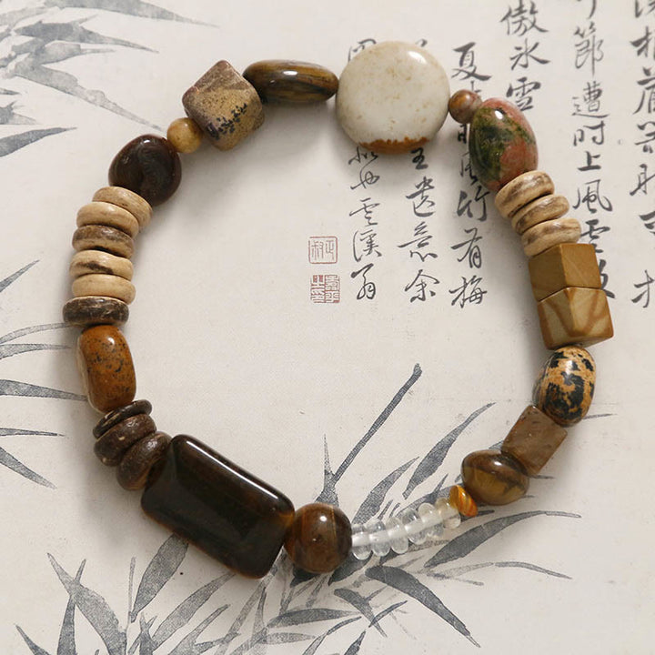 Pulsera de coraje con ojo de tigre y cáscara de coco de Buddha Stones