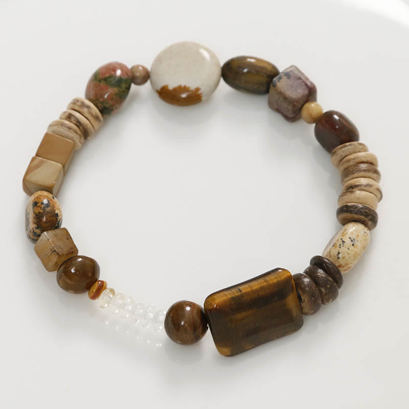 Pulsera de coraje con ojo de tigre y cáscara de coco de Buddha Stones