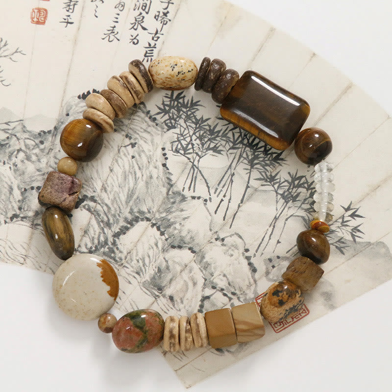 Pulsera de coraje con ojo de tigre y cáscara de coco de Buddha Stones