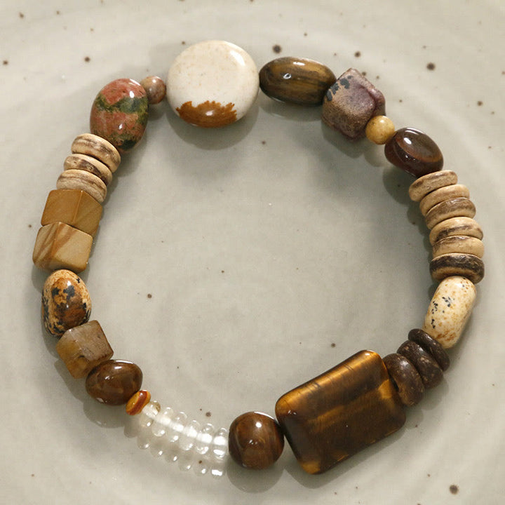Pulsera de coraje con ojo de tigre y cáscara de coco de Buddha Stones