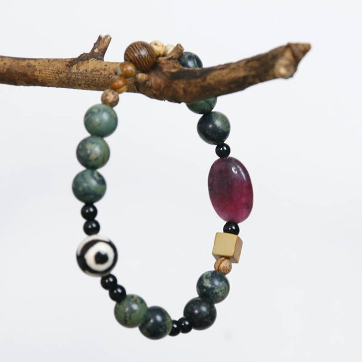 Pulsera de éxito con cuentas Dzi de tres ojos y ágata verde de Buddha Stones