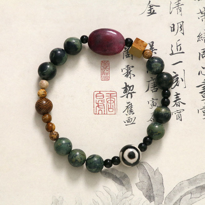 Pulsera de éxito con cuentas Dzi de tres ojos y ágata verde de Buddha Stones