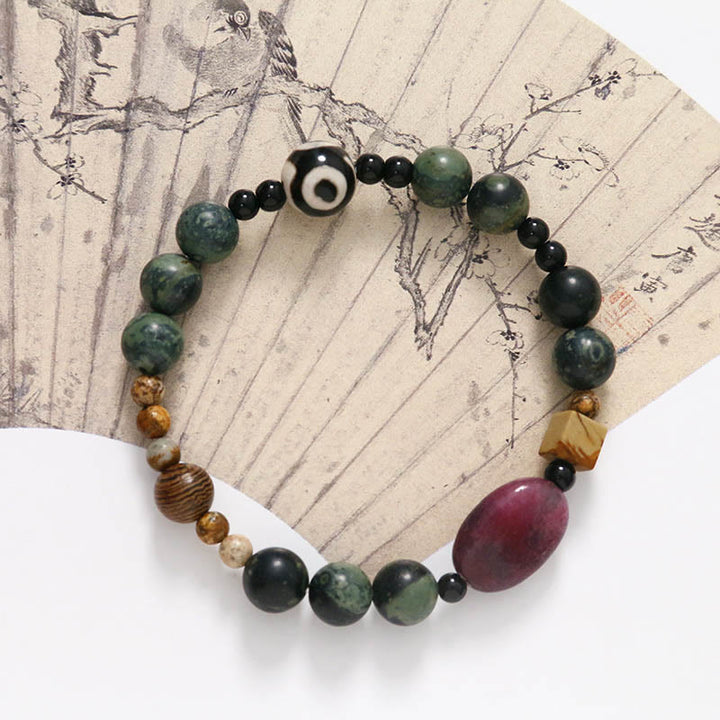 Pulsera de éxito con cuentas Dzi de tres ojos y ágata verde de Buddha Stones
