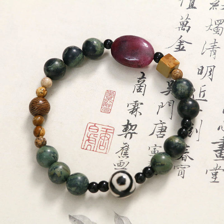 Pulsera de éxito con cuentas Dzi de tres ojos y ágata verde de Buddha Stones