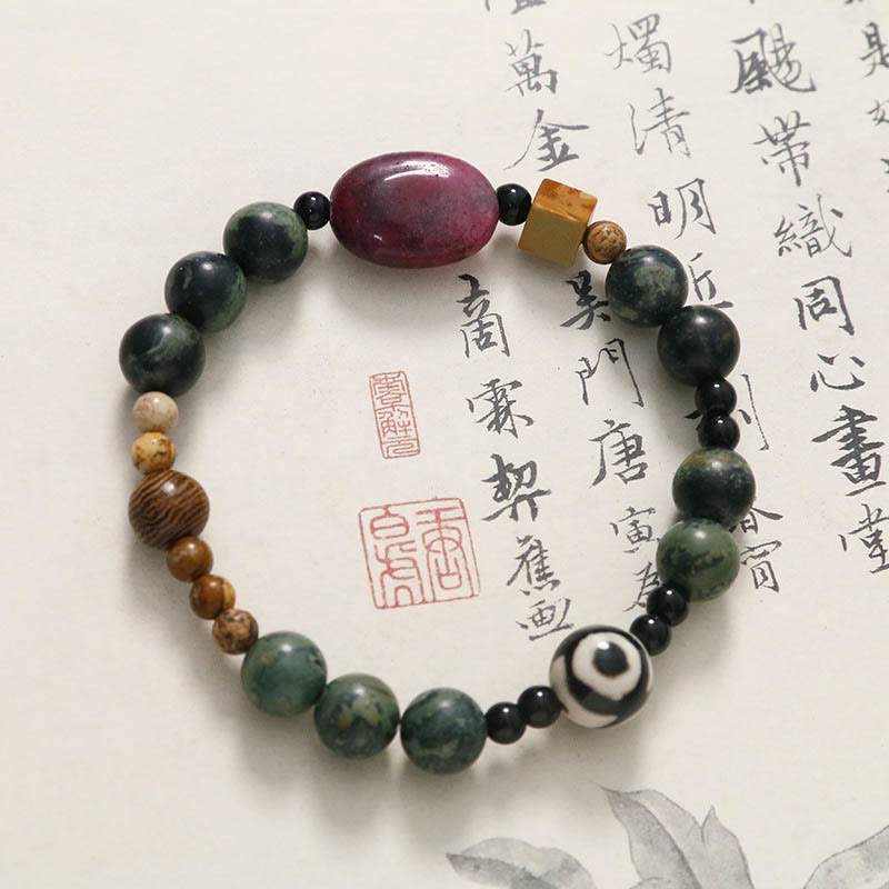 Pulsera de éxito con cuentas Dzi de tres ojos y ágata verde de Buddha Stones