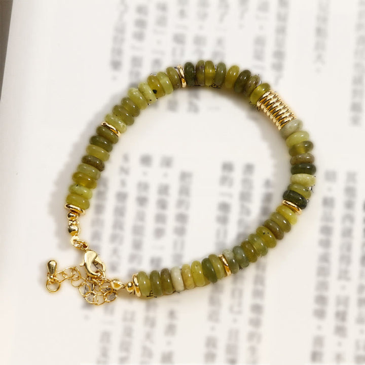 Pulsera curativa de éxito con jade cian dorado y Buddha Stones