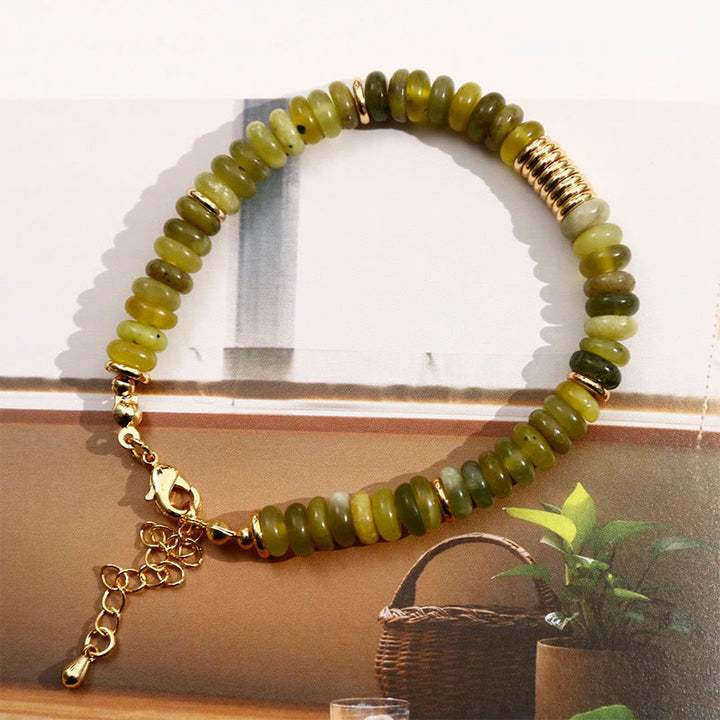 Pulsera curativa de éxito con jade cian dorado y Buddha Stones