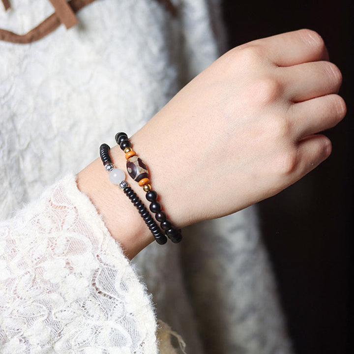 Pulsera de doble vuelta con cuentas Dzi de sándalo, ébano y sándalo verde y Buddha Stones