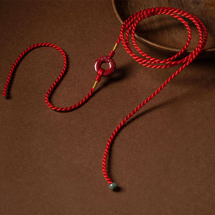 Cadena para el vientre con hilo rojo y hebilla de paz con cinabrio natural y Buddha Stones