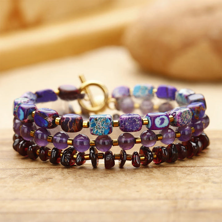 Pulsera de comunicación con triple vuelta de piedra emperador, amatista y granate de Buddha Stones