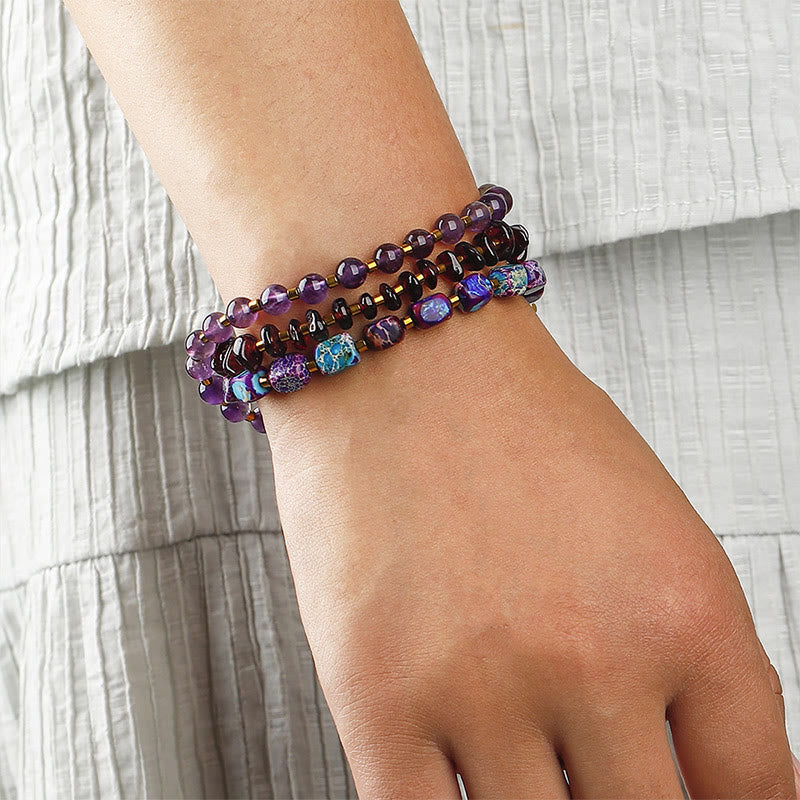 Pulsera de comunicación con triple vuelta de piedra emperador, amatista y granate de Buddha Stones