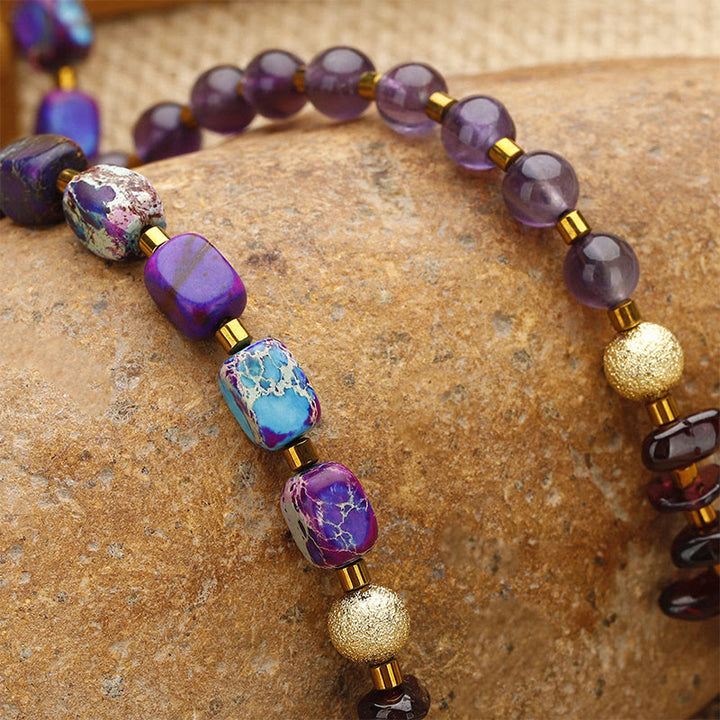 Pulsera de comunicación con triple vuelta de piedra emperador, amatista y granate de Buddha Stones
