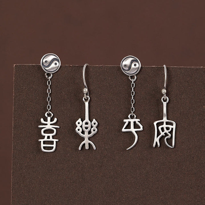 Pendientes de protección con caracteres chinos "Ping An" y "Xi Le" en plata de ley 925 con Buddha Stones